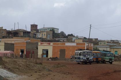 The center of Adi Nfas with buses at the village stop.